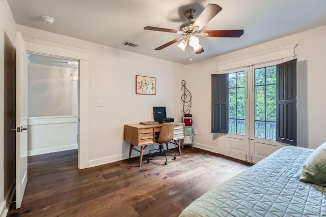 1117 Algarita Ave, Austin, TX 78704 - bedroom with wood-type flooring, an office area, and a ceiling fan