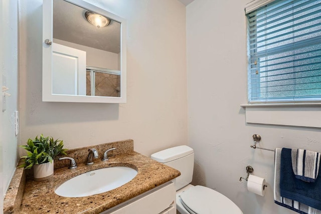 1117 Algarita Ave, Austin, TX 78704 - bathroom featuring vanity and a shower with door