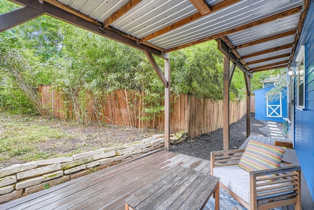 1117 Algarita Ave, Austin, TX 78704 - wooden deck with a fenced backyard and a shed