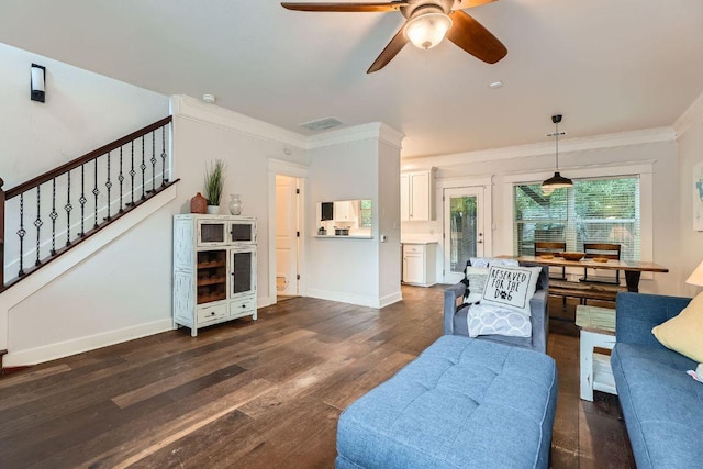 1117 Algarita Ave, Austin, TX 78704 - living area featuring crown molding, dark wood-type flooring, a ceiling fan, and stairs