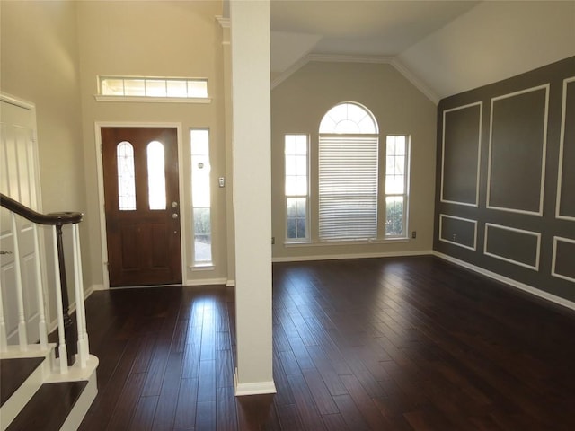 4008 Sable Oaks Dr, Round Rock, TX 78664 - entryway with dark wood finished floors, stairs, and high vaulted ceiling