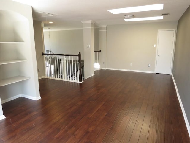 4008 Sable Oaks Dr, Round Rock, TX 78664 - empty room with attic access, wood finished floors, and built in shelves