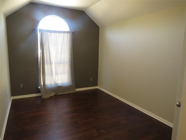 4008 Sable Oaks Dr, Round Rock, TX 78664 - spare room featuring dark wood-style flooring and lofted ceiling