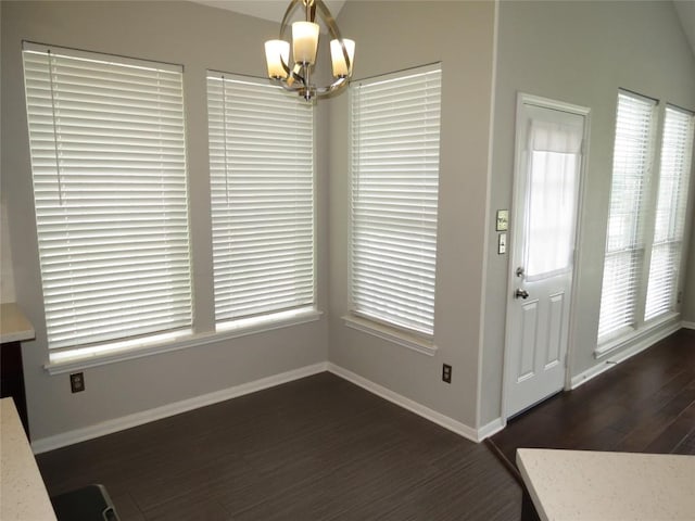 4008 Sable Oaks Dr, Round Rock, TX 78664 - unfurnished dining area featuring a chandelier and dark wood-style floors