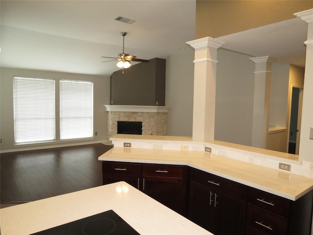 4008 Sable Oaks Dr, Round Rock, TX 78664 - kitchen with ceiling fan, decorative columns, open floor plan, light countertops, and wood finished floors