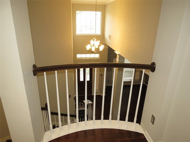 4008 Sable Oaks Dr, Round Rock, TX 78664 - stairway with a chandelier and ornamental molding