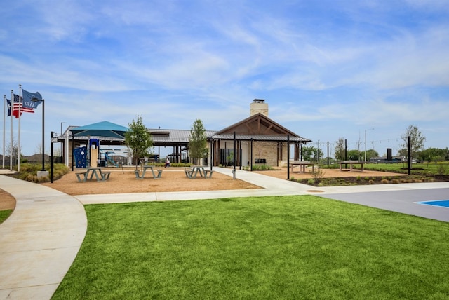 13613 Thomas Wheeler Way, Manor, TX 78653 - view of community with a lawn and a gazebo