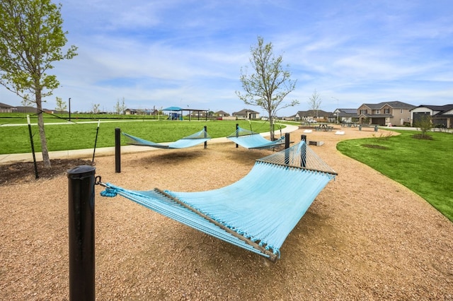 13613 Thomas Wheeler Way, Manor, TX 78653 - view of property's community with a yard and a residential view