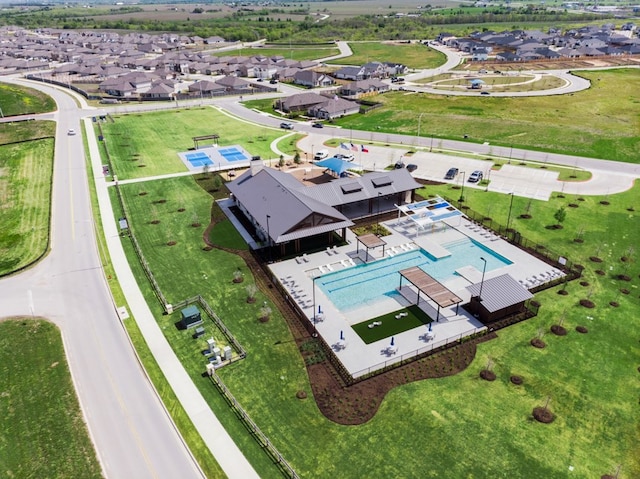 13613 Thomas Wheeler Way, Manor, TX 78653 - aerial view of residential area with a pool area
