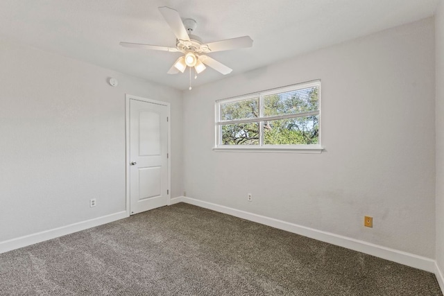 4003 Park Dr, Round Rock, TX 78681 - spare room featuring dark colored carpet and ceiling fan