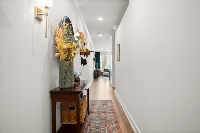 1900 Barton Springs Rd Unit 3038, Austin, TX 78704 - hall featuring wood finished floors, recessed lighting, and crown molding