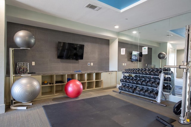 1900 Barton Springs Rd Unit 3038, Austin, TX 78704 - gym with tile walls