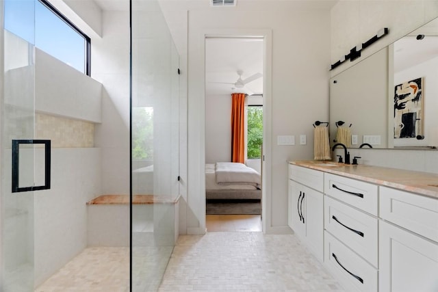 4911 Duval, Austin, TX 78751 - full bathroom featuring double vanity, walk in shower, and ensuite bathroom