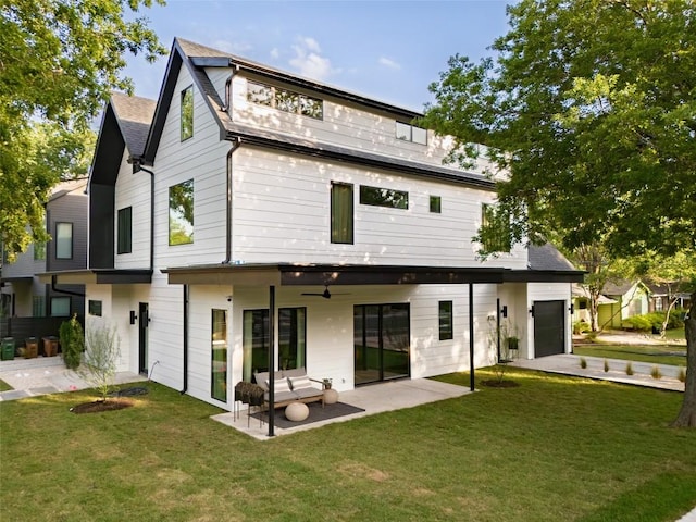 4911 Duval, Austin, TX 78751 - rear view of property with ceiling fan, a lawn, a patio, and a shingled roof