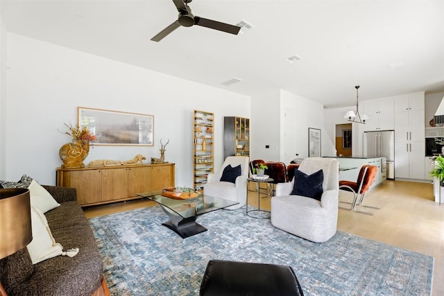 4911 Duval, Austin, TX 78751 - living area with light wood-style flooring and a ceiling fan