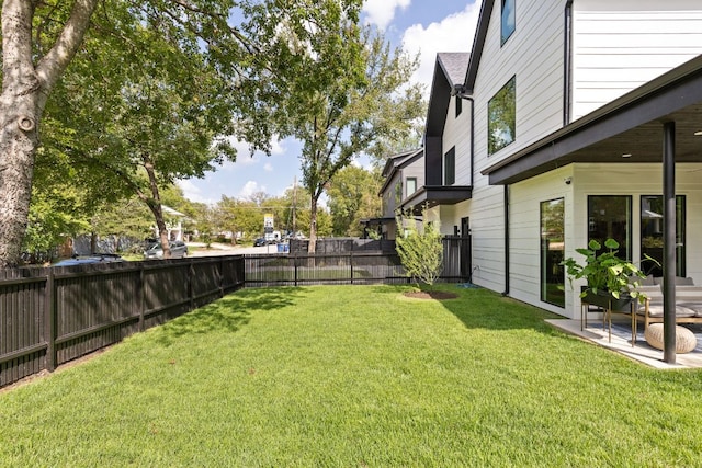 4911 Duval, Austin, TX 78751 - fenced backyard featuring a patio area