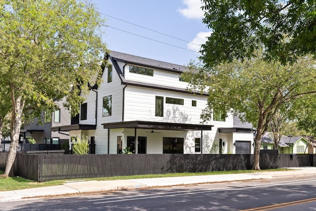 4911 Duval, Austin, TX 78751 - view of front of house featuring a fenced front yard and a ceiling fan