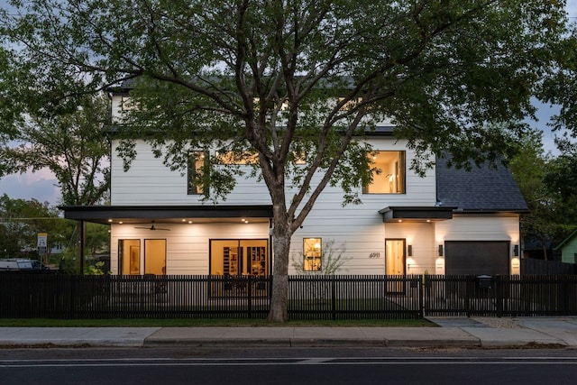 4911 Duval, Austin, TX 78751 - view of front facade with a fenced front yard
