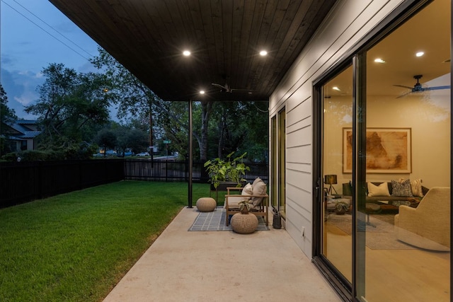 4911 Duval, Austin, TX 78751 - fenced backyard featuring ceiling fan, a patio, and outdoor lounge area
