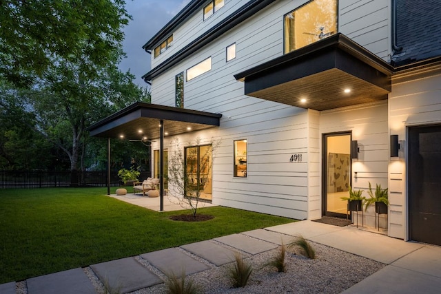 4911 Duval, Austin, TX 78751 - rear view of house with a patio area