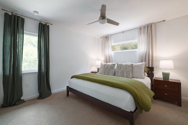1303 Deloney St, Austin, TX 78721 - bedroom with carpet and a ceiling fan