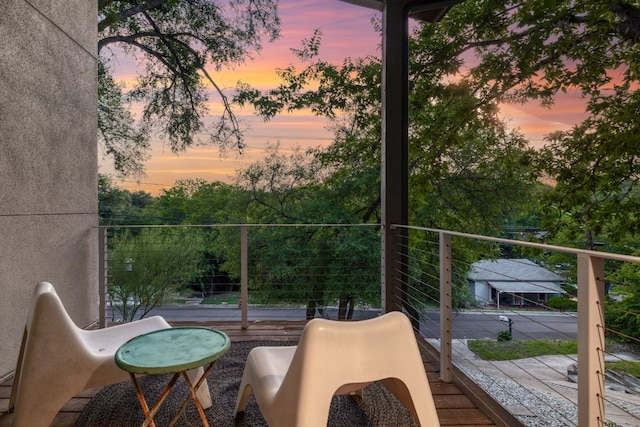 1303 Deloney St, Austin, TX 78721 - view of balcony at dusk