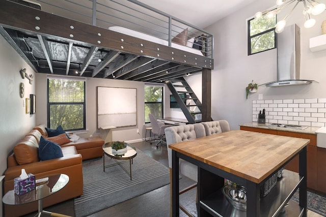 1305 Deloney St, Austin, TX 78721 - living area with plenty of natural light and stairs
