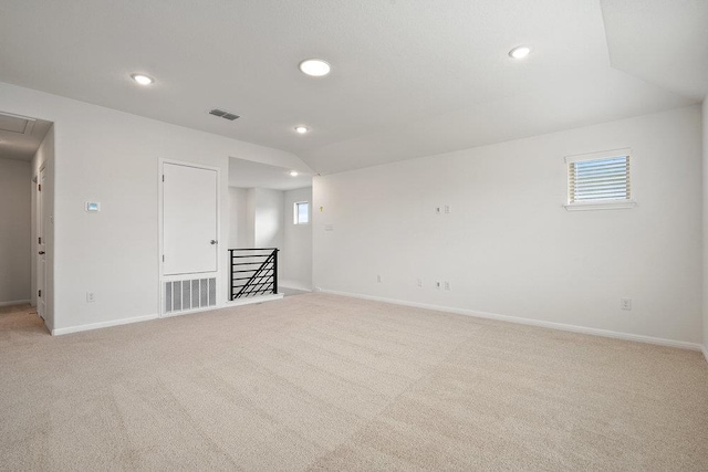 13228 Ditka Dr, Austin, TX 78652 - spare room featuring recessed lighting, light carpet, and attic access