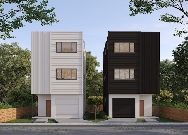4104 Tannehill Ln, Austin, TX 78721 - contemporary home featuring stucco siding and a garage
