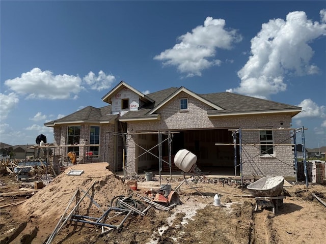 20504 Ed Townes Ter, Manor, TX 78653 - back of property with brick siding and a shingled roof