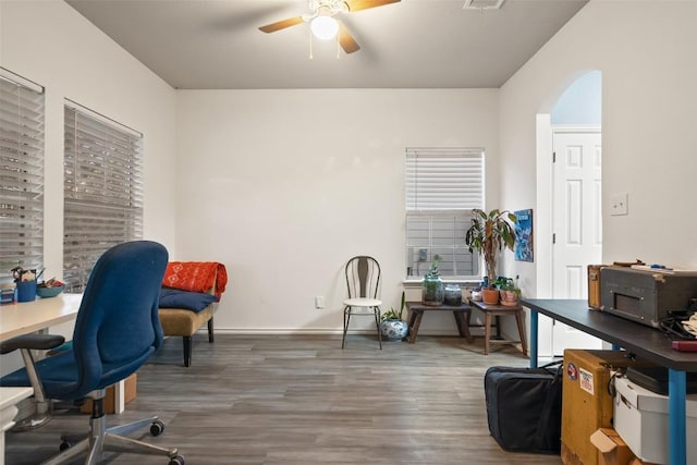 9206 Brents Elm Dr, Austin, TX 78744 - office space featuring ceiling fan, wood finished floors, and arched walkways