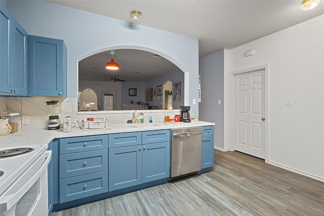 9206 Brents Elm Dr, Austin, TX 78744 - kitchen with dishwasher, a ceiling fan, blue cabinetry, arched walkways, and light wood finished floors