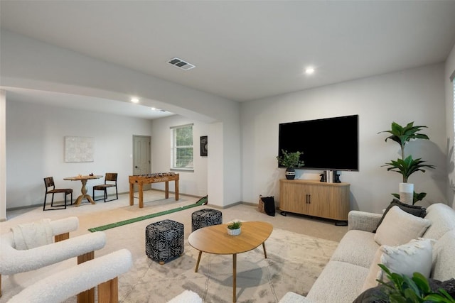 15908 Spillman Ranch Loop, Austin, TX 78738 - living area with light colored carpet, recessed lighting, and arched walkways