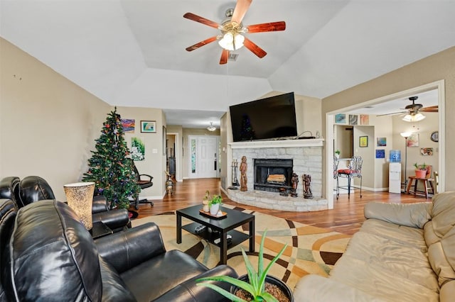 21013 Ridgeview Loop, Lago Vista, TX 78645 - living area featuring ceiling fan, wood finished floors, and a fireplace