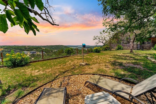 21013 Ridgeview Loop, Lago Vista, TX 78645 - view of yard at dusk