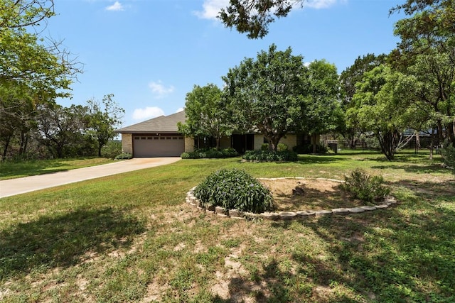 21013 Ridgeview Loop, Lago Vista, TX 78645 - view of front of home with a garage, concrete driveway, a front lawn, and brick siding