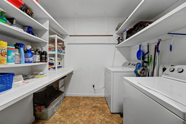 21013 Ridgeview Loop, Lago Vista, TX 78645 - washroom featuring washing machine and dryer and baseboards