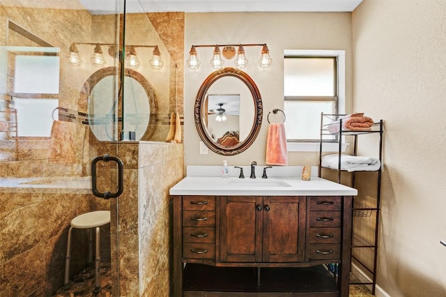 21013 Ridgeview Loop, Lago Vista, TX 78645 - bathroom featuring vanity, a stall shower, and a ceiling fan