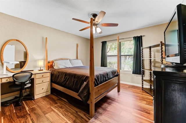 21013 Ridgeview Loop, Lago Vista, TX 78645 - bedroom featuring wood finished floors and ceiling fan