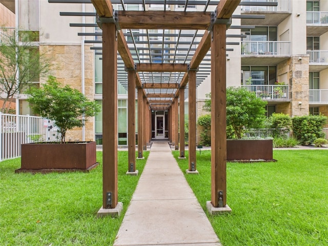 1600 Barton Springs Rd Unit 5107, Austin, TX 78704 - view of home's community with a pergola and a yard