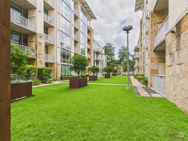 1600 Barton Springs Rd Unit 5107, Austin, TX 78704 - view of property's community featuring a lawn