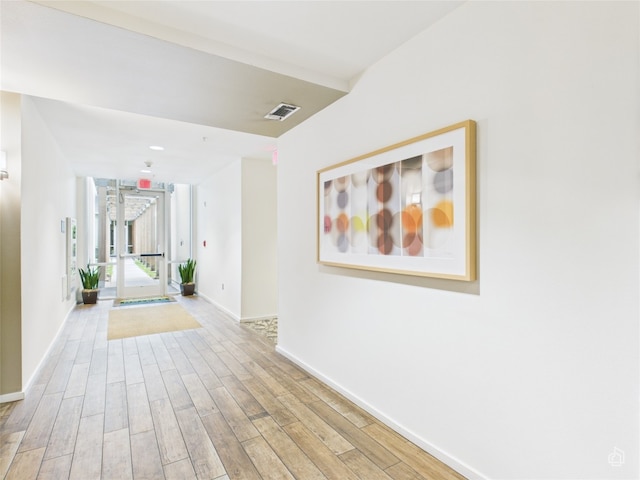 1600 Barton Springs Rd Unit 5107, Austin, TX 78704 - hallway with wood finished floors and baseboards