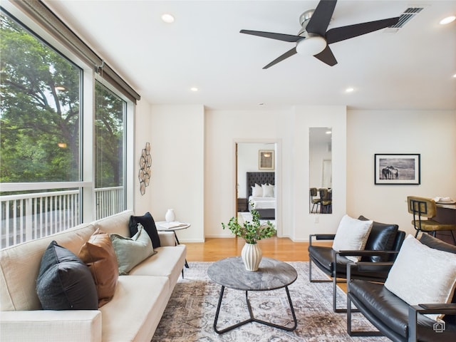 1600 Barton Springs Rd Unit 5107, Austin, TX 78704 - living area with wood finished floors, recessed lighting, and ceiling fan