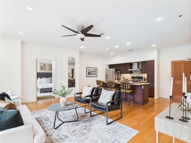 1600 Barton Springs Rd Unit 5107, Austin, TX 78704 - living area featuring a ceiling fan, light wood-style floors, and recessed lighting