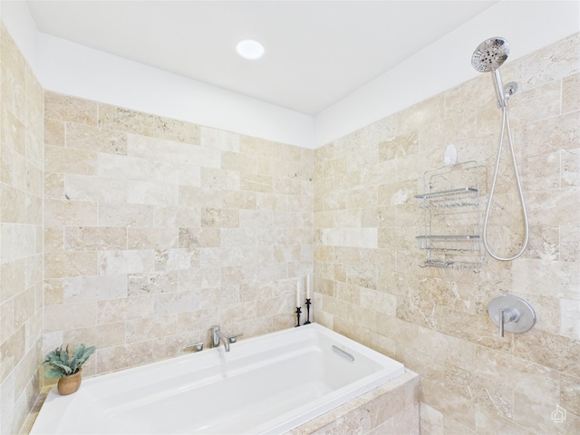 1600 Barton Springs Rd Unit 5107, Austin, TX 78704 - full bath featuring a garden tub, a tile shower, and tile walls