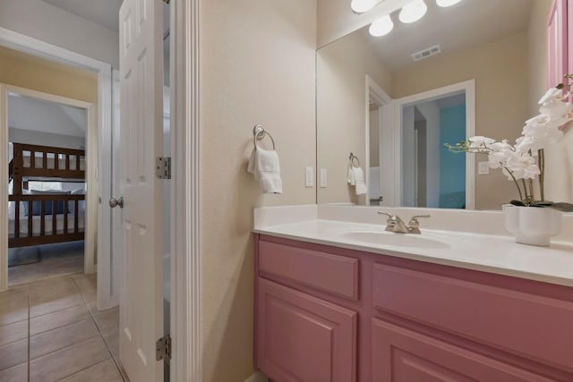 7617 Roaring Springs Dr, Austin, TX 78736 - bathroom featuring tile patterned floors and vanity
