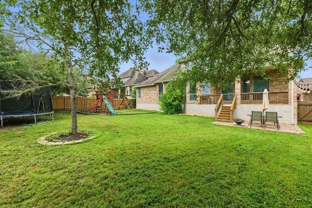 7617 Roaring Springs Dr, Austin, TX 78736 - fenced backyard with a trampoline and a playground