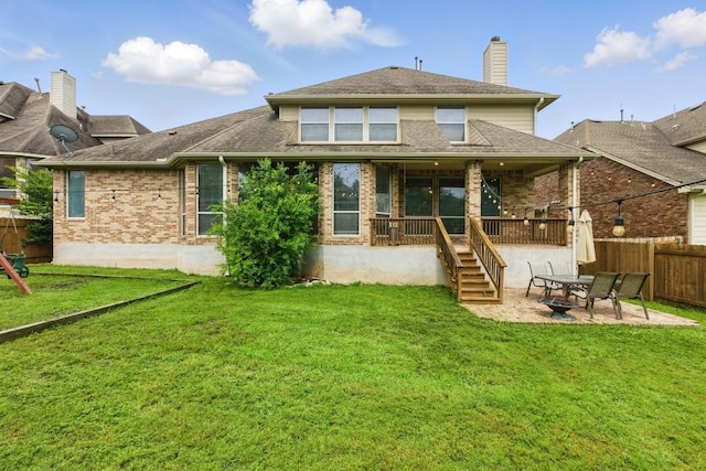 7617 Roaring Springs Dr, Austin, TX 78736 - rear view of house featuring a chimney, brick siding, covered porch, and a patio