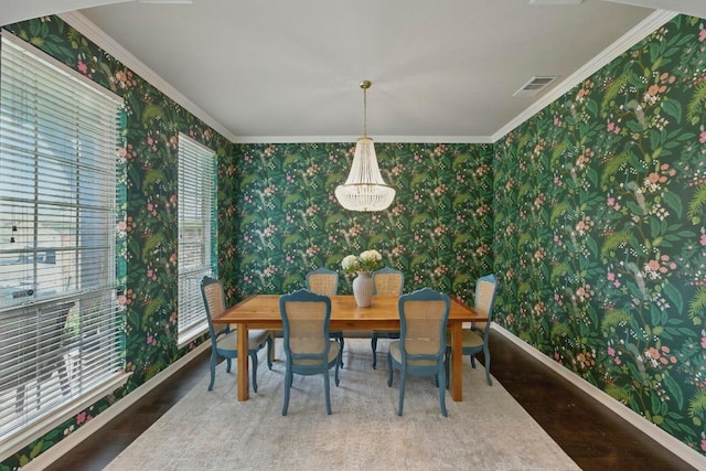 7617 Roaring Springs Dr, Austin, TX 78736 - dining area featuring wallpapered walls, ornamental molding, and wood finished floors