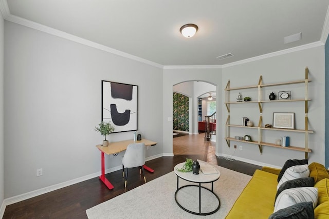 7617 Roaring Springs Dr, Austin, TX 78736 - living room with arched walkways, crown molding, and wood finished floors